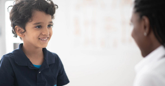 child patient with doctor