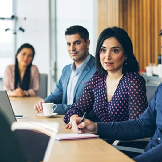 colleagues-looking-to-key-speaker-in-a-meeting