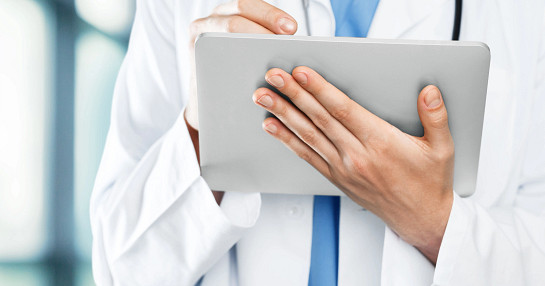 Doctor with tablet Doctor with tablet
