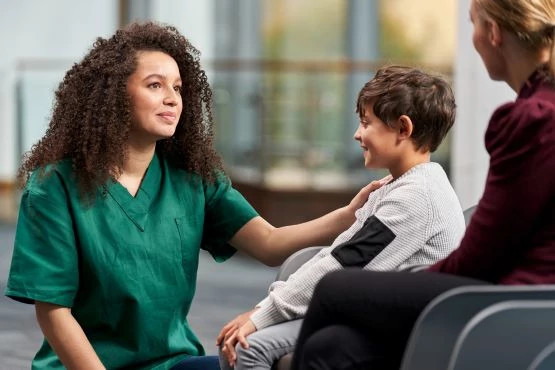 Nurse-in-scrubs-parent-engagement555x370 Nurse-in-scrubs-parent-engagement555x370