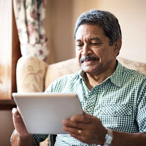 Patient using ipad.jpg Patient using ipad.jpg