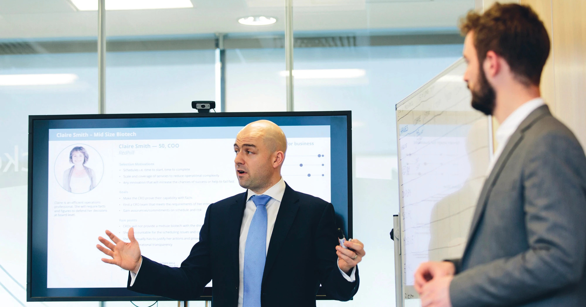 Two-men-giving-presentation-image